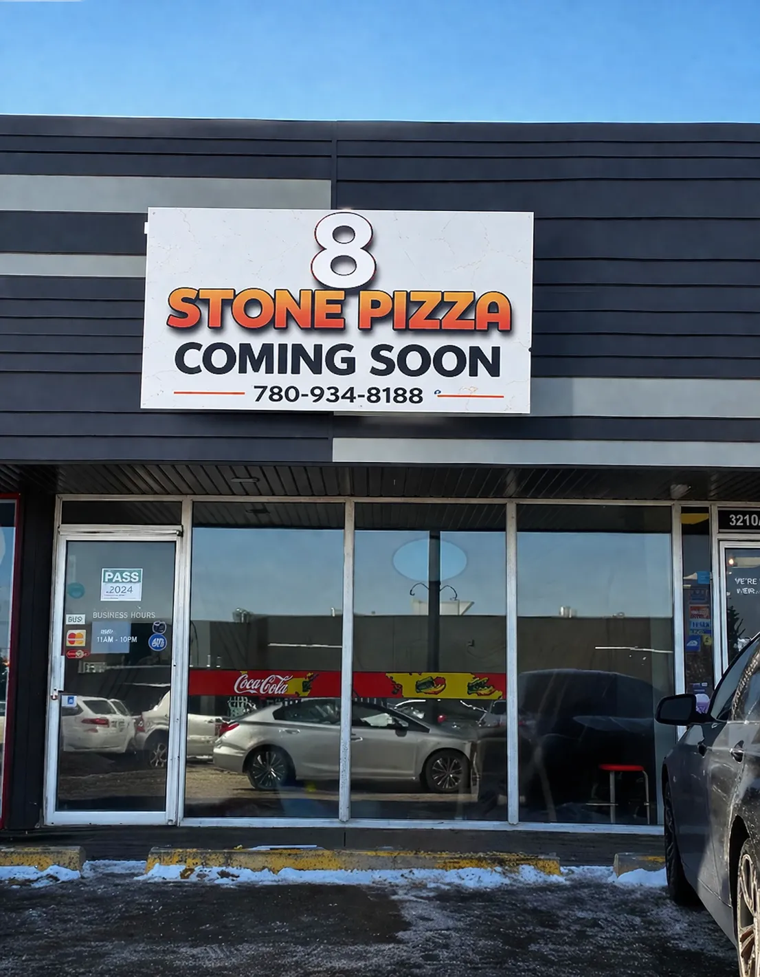 Fresh oven-baked pizza being prepared at 8 Stone Pizza Edmonton